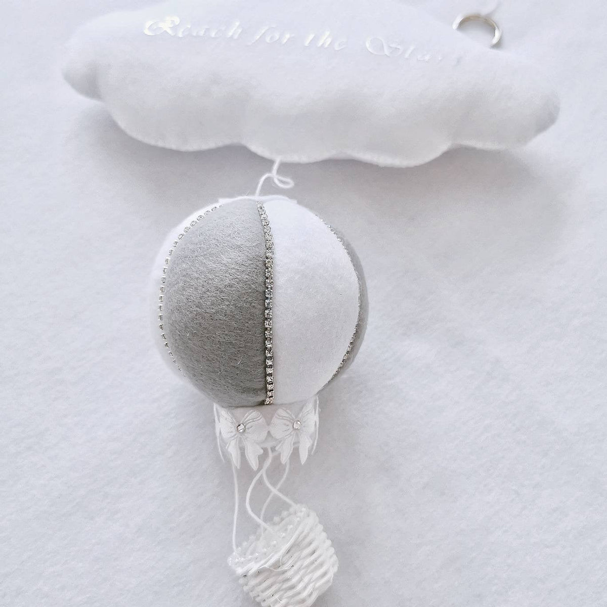 balloon and cloud nursery decor with inspirational message and soft, timeless design.