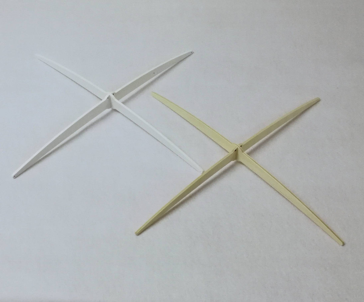 Exclusive white wooden cross-style hanger designed by Happy Little Cloud, used for all artisan baby mobiles.