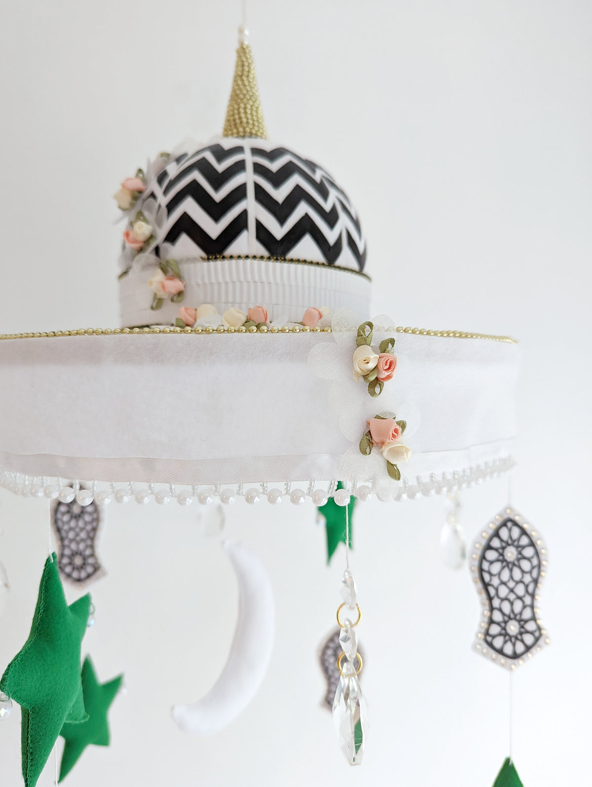 Handmade Islamic baby mobile with mosque dome, hanging crescent moon, stars, and sacred sandal symbols—ideal for a meaningful nursery.

