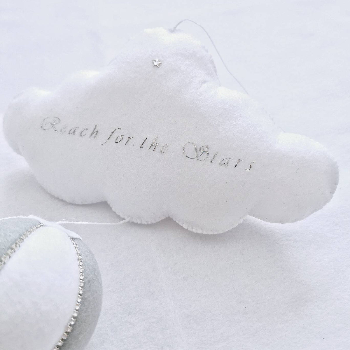 Heirloom wall charm featuring a felt hot air balloon with braided basket and soft neutral colours. Perfect Christening gift