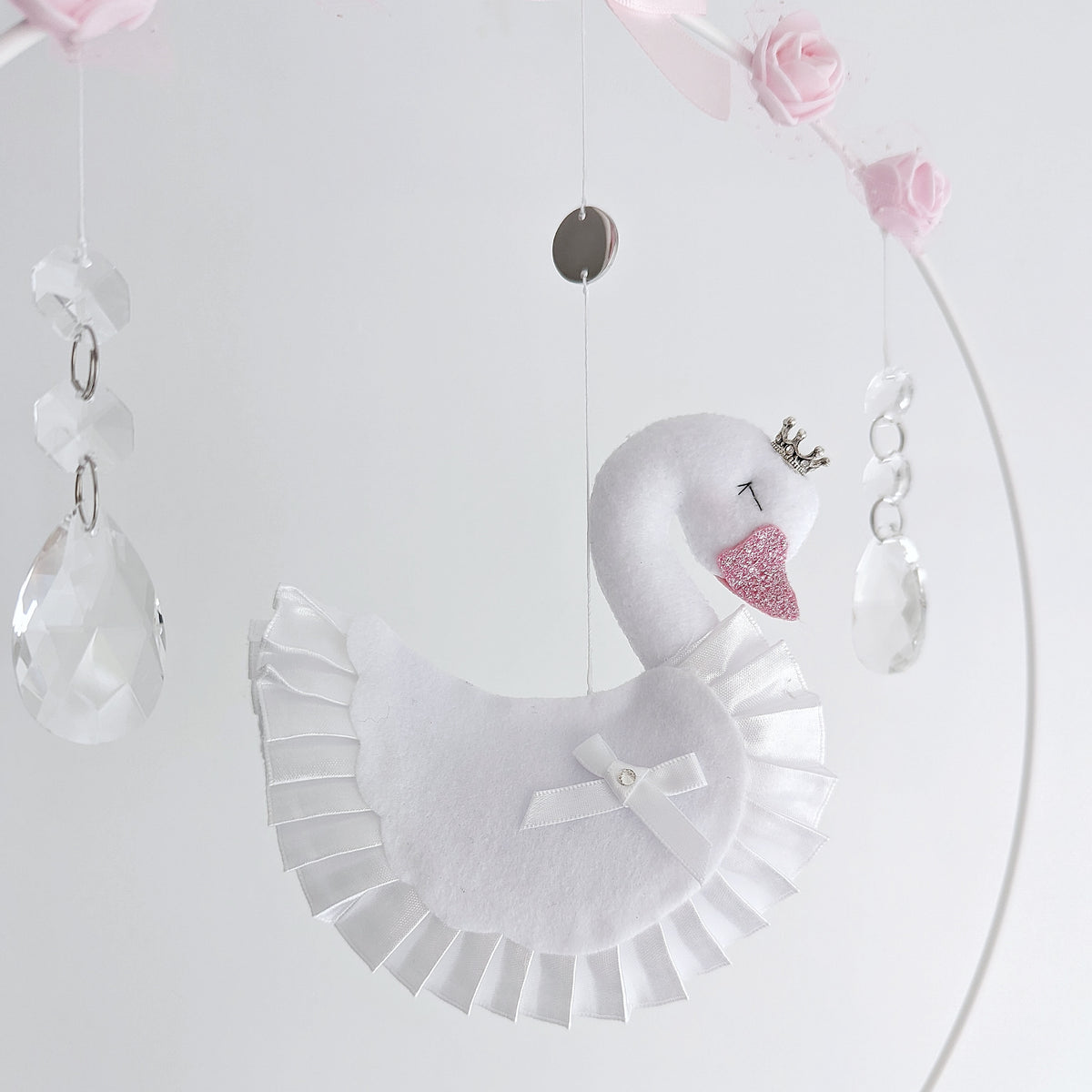Sweet swan princess mobile with pink hearts, clouds, and a handcrafted balloon, perfect for a baby girl’s space.
